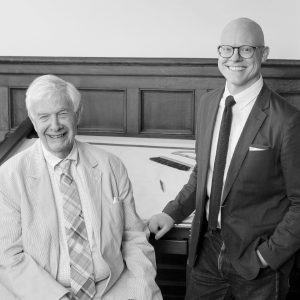 a couple of men shaking hands